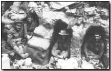 Canadian 87th Battalion troops resting in a trench near Willerval, April, 1918