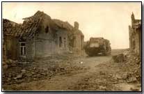 British tank moving through town