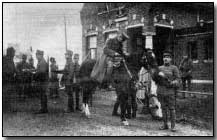 German officer giving his sable to Dutch officer at the borderhouse in Roosteren, 1918